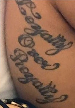 A picture of 'Loyalty Over Beauty' tat of Cardi B.